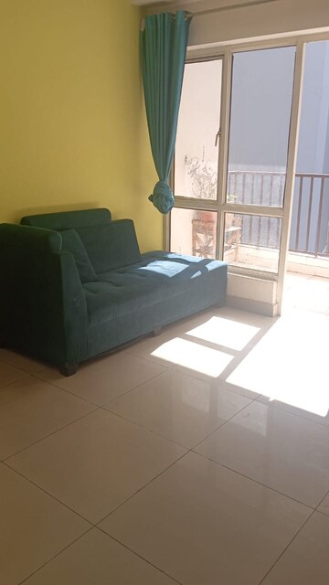 Living Room in 2.5 BHK Apartment at Amrapali Princely Estate, Sector 76 – for Rent