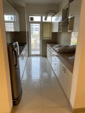 Kitchen in 3 BHK Apartment at Emaar Palm Gardens, Sector 83 – for Rent
