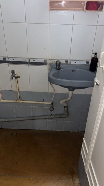 Bathroom in 1 BHK Apartment at Brahmand CHS, Brahmand – for Sale