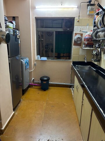 Kitchen in 1 BHK Apartment at Brahmand CHS, Brahmand – for Sale