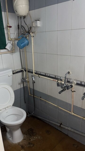 Bathroom in 1 BHK Apartment at Brahmand CHS, Brahmand – for Sale