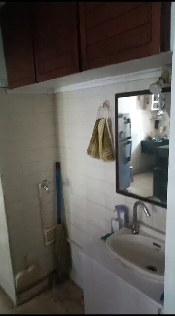 Bathroom in 2 BHK Apartment at Ram Janki Apartment, Vile Parle East – for Rent