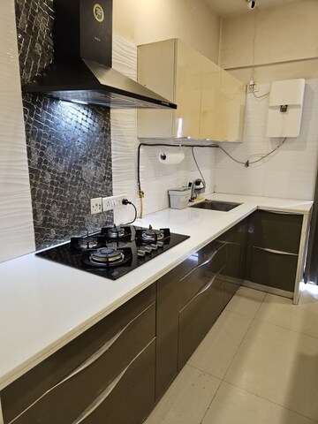 Kitchen in 2 BHK Apartment at Eden Rose CHS, Vasai East – for Sale
