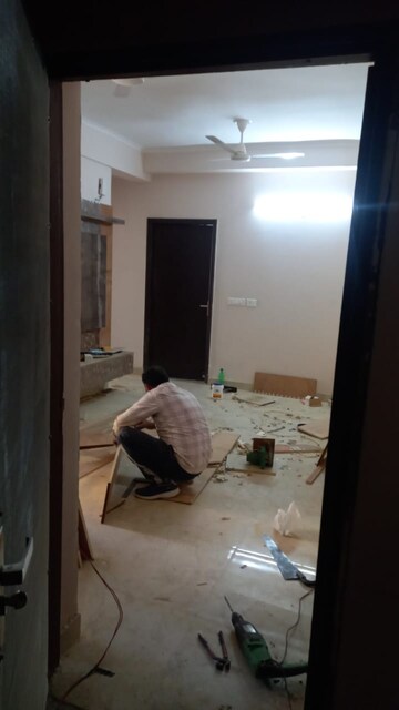 Living Room in 2 BHK Apartment at Amrapali Golf Homes, Sector 4, Greater Noida – for Sale