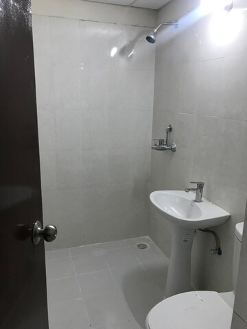 Bathroom in 2.5 BHK Apartment at Jm Orchid, Sector 76 – for Sale