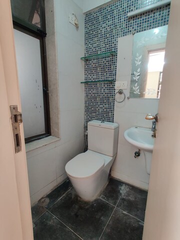 Bathroom in 2 BHK Apartment at The Wadhwa Woodland Height, Bandra West – for Rent