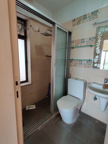 Bathroom in 2 BHK Apartment at The Wadhwa Woodland Height, Bandra West – for Rent