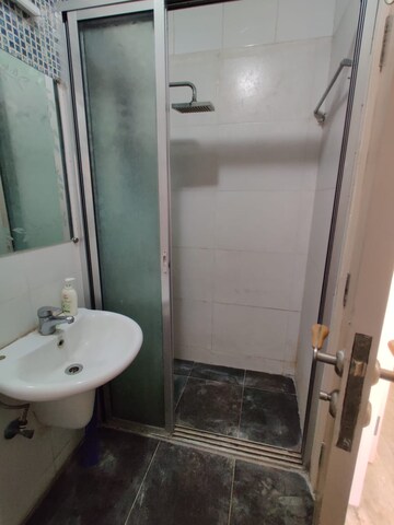 Bathroom in 2 BHK Apartment at The Wadhwa Woodland Height, Bandra West – for Rent