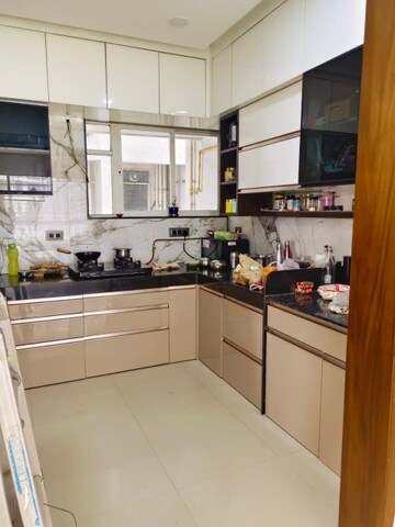 Kitchen in 2 BHK Apartment at Krishna Dham Housing Society, Vasai East – for Sale