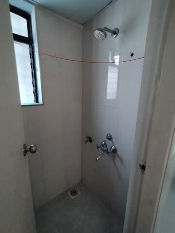 Bathroom in 1 BHK Apartment at Lodha Golden Dream, Dombivli East – for Rent