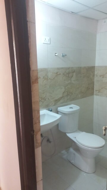 Bathroom in 2 BHK Apartment at Amrapali Golf Homes, Sector 4, Greater Noida – for Rent