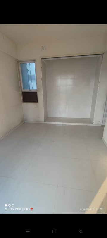 Room in 2 BHK Apartment at Vijay Galaxy, Waghbil – for Sale