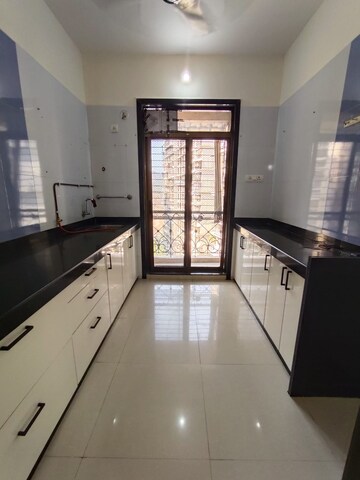 Kitchen in 2 BHK Apartment at Hyde Park CHS, Kharghar – for Sale