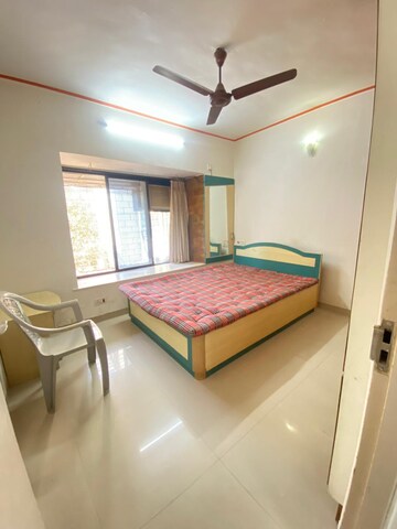 Bedroom in 2 BHK Apartment at Lokhandwala Township Kandivali – for Rent