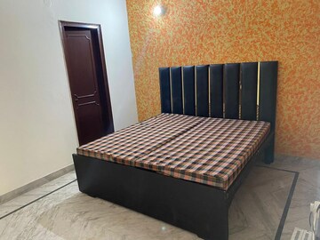 Bedroom in 2.5 BHK Builder Floor at Ansal Sushant Lok I, Sector 43 – for Rent