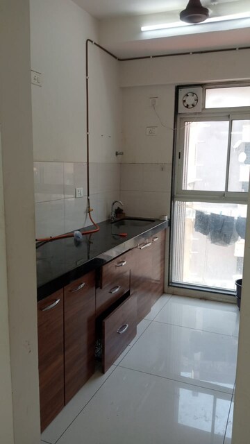 Kitchen in 1 BHK Apartment at Godrej Tranquil, Kandivali East – for Rent
