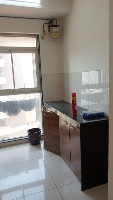 Kitchen in 1 BHK Apartment at Godrej Tranquil, Kandivali East – for Rent