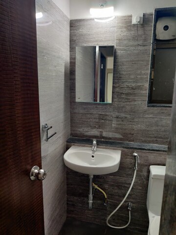 Bathroom in 2 BHK Apartment at Acme Ozone, Manpada – for Sale