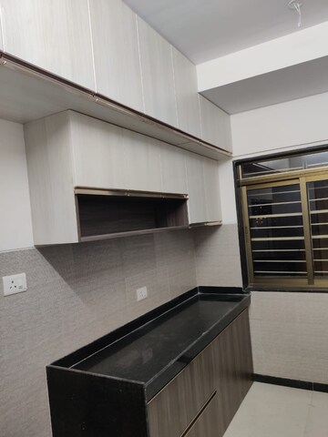 Kitchen in 2 BHK Apartment at Acme Ozone, Manpada – for Sale