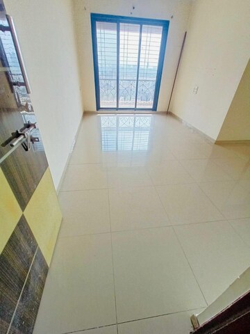 Living Room in 2 BHK Apartment at Hyde Park CHS, Kharghar – for Rent