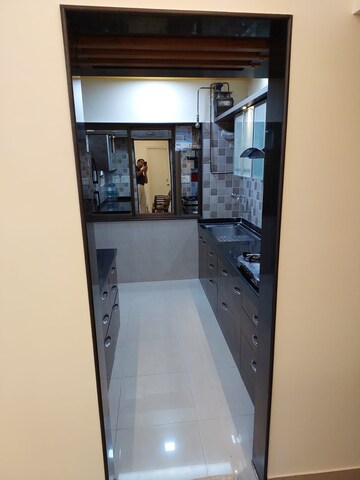 Kitchen in 2 BHK Apartment at Hyde Park Galaxy, Manpada – for Sale