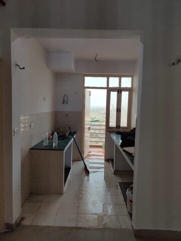 Building Lobby in 2 BHK Apartment at RAS Palm Residency, Sector 76 – for Rent