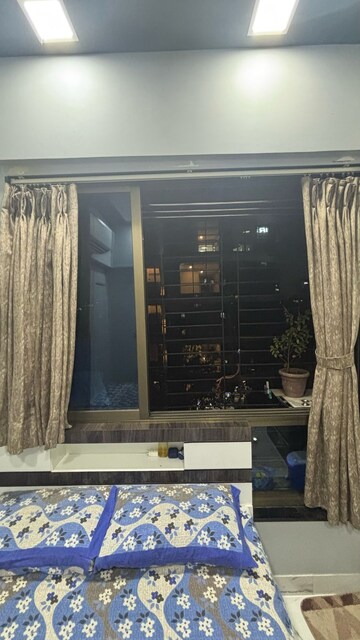 Living Room in 2 BHK Apartment at Hubtown Palmrose, Andheri East – for Rent