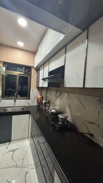 Kitchen in 2 BHK Apartment at Hubtown Palmrose, Andheri East – for Rent