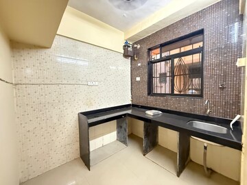 Kitchen in 2 BHK Apartment at Seawoods West – for Sale