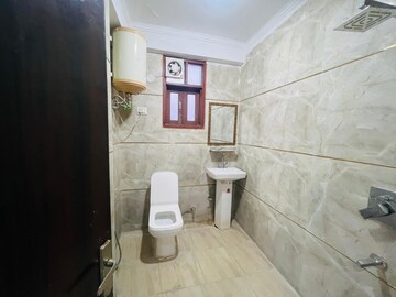 Bathroom in 3 BHK Apartment at Chattarpur – for Rent