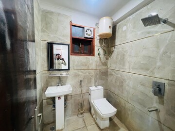 Bathroom in 3 BHK Apartment at Chattarpur – for Rent