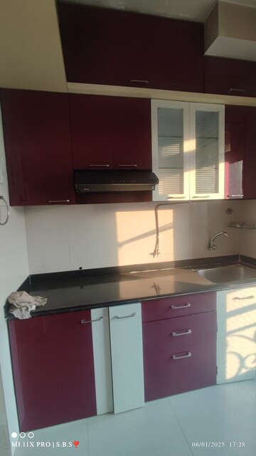 Kitchen in 2 BHK Apartment at Vijay Galaxy, Waghbil – for Sale