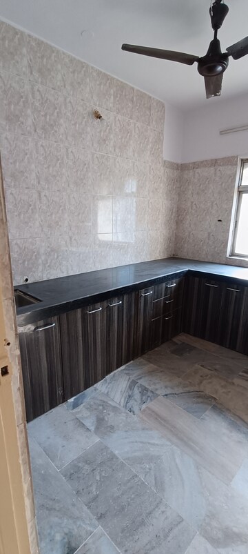 Kitchen in 2 BHK Apartment at Crimson Tower, Kandivali East – for Rent