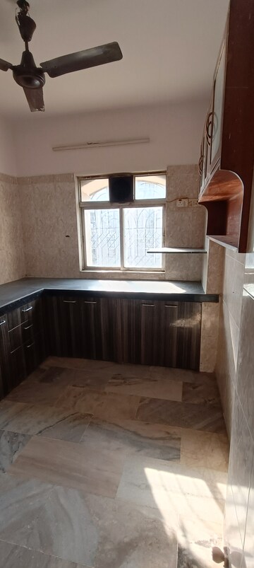 Kitchen in 2 BHK Apartment at Crimson Tower, Kandivali East – for Rent