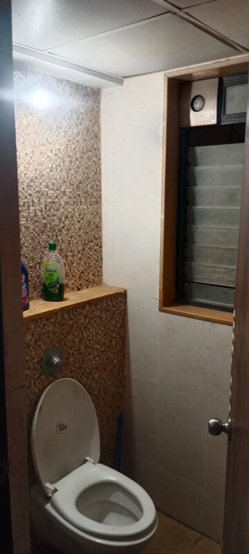 Bathroom in 2 BHK Apartment at Lodha Lakeshore Greens, Dombivli East – for Rent