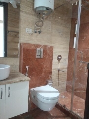 Bathroom in 4 BHK Builder Floor at Maharani Bagh – for Rent