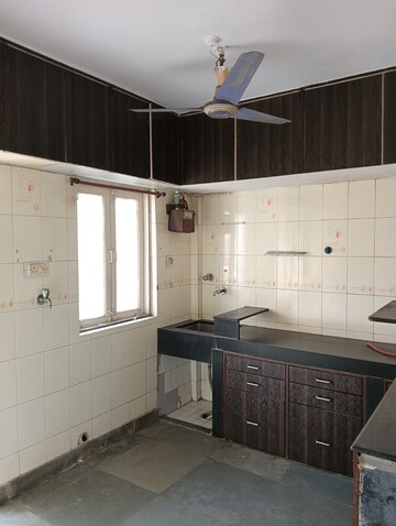 Kitchen in 2 BHK Apartment at Himgiri Lokupvan Phase II CHS Ltd, Vasant Vihar – for Sale