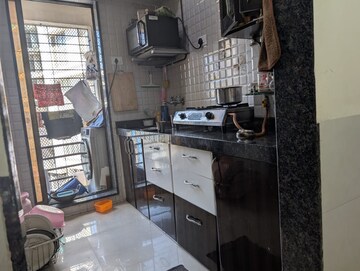 Kitchen in 2 BHK Apartment at Teerth Plaza, Mira Road – for Sale