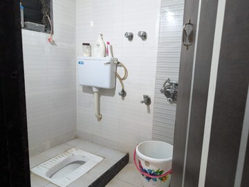 Bathroom in 2 BHK Apartment at Teerth Plaza, Mira Road – for Sale