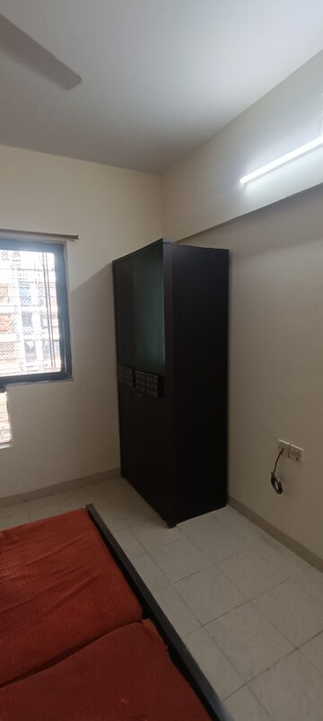 Room in 2 BHK Apartment at Lokhandwala Township Kandivali – for Rent
