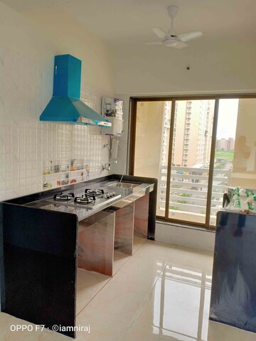 Kitchen in 1 BHK Apartment at Rustomjee Global City – for Sale