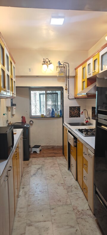 Kitchen in 3 BHK Apartment at Arshie Complex, Versova – for Rent