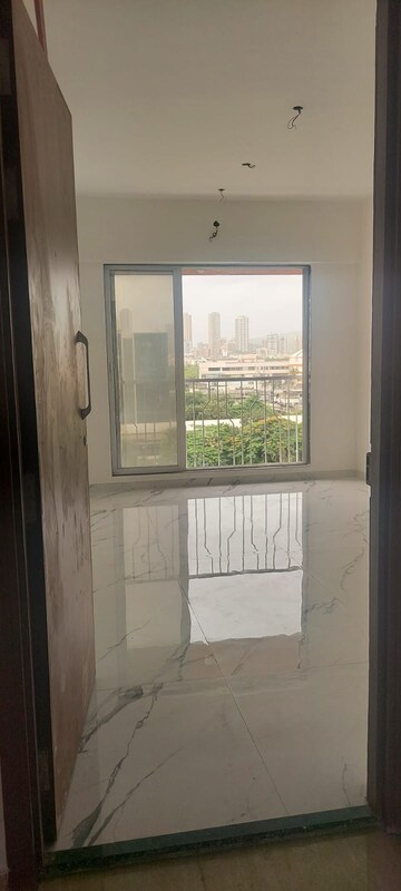 Room in 2 BHK Apartment at DPS Greens, Kandivali East – for Sale