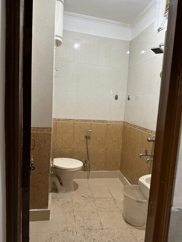 Bathroom in 2 BHK Builder Floor at Mehrauli – for Rent