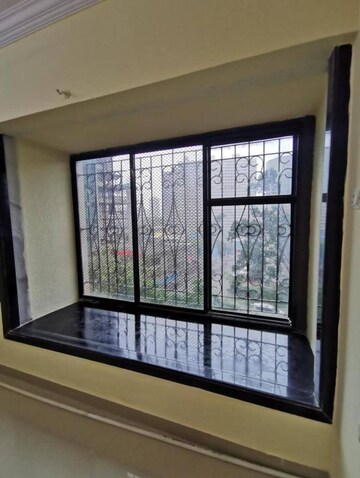 Bedroom in 2 BHK Apartment at Shree Vallabh Tower, Malad West – for Rent