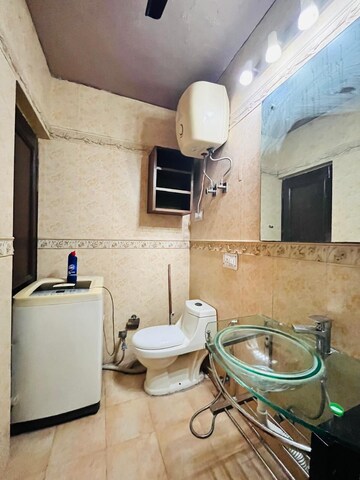 Bathroom in 2 BHK Apartment at Green Park Extension – for Rent