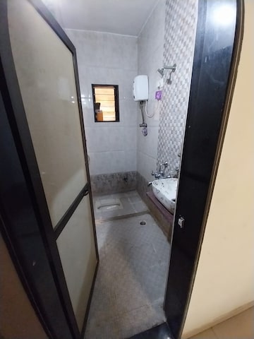 Bathroom in 2 BHK Apartment at Kopar Khairane – for Sale
