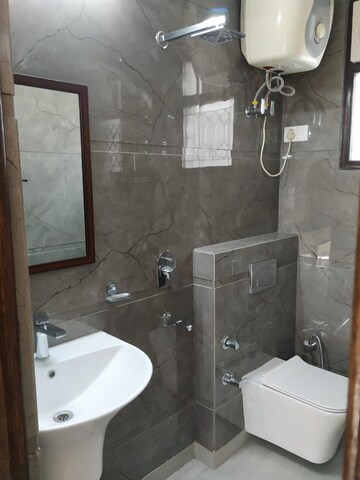 Bathroom in 3 BHK Apartment at Panchsheel Vihar – for Sale