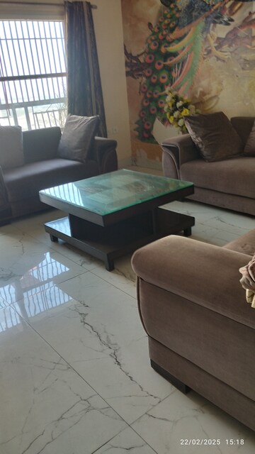 Living Room in 4 BHK Apartment at Antriksh Golf View, Sector 78 – for Rent