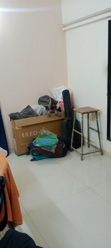 Living Room in 1 BHK Apartment at Bindra Complex, Andheri East – for Rent